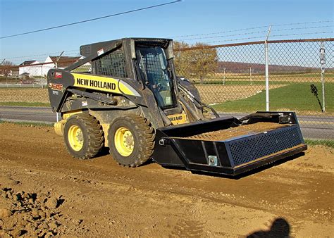 mini skid steer rake attachment|rock attachment for skid steer.